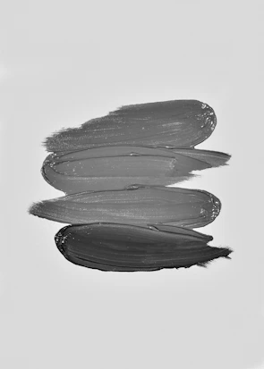 Elegant framed art print featuring minimalist brush strokes on white background.