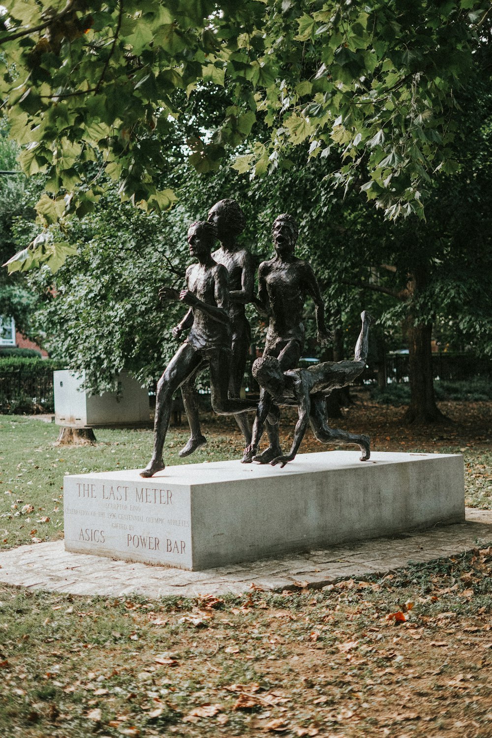 2 men riding horse statue