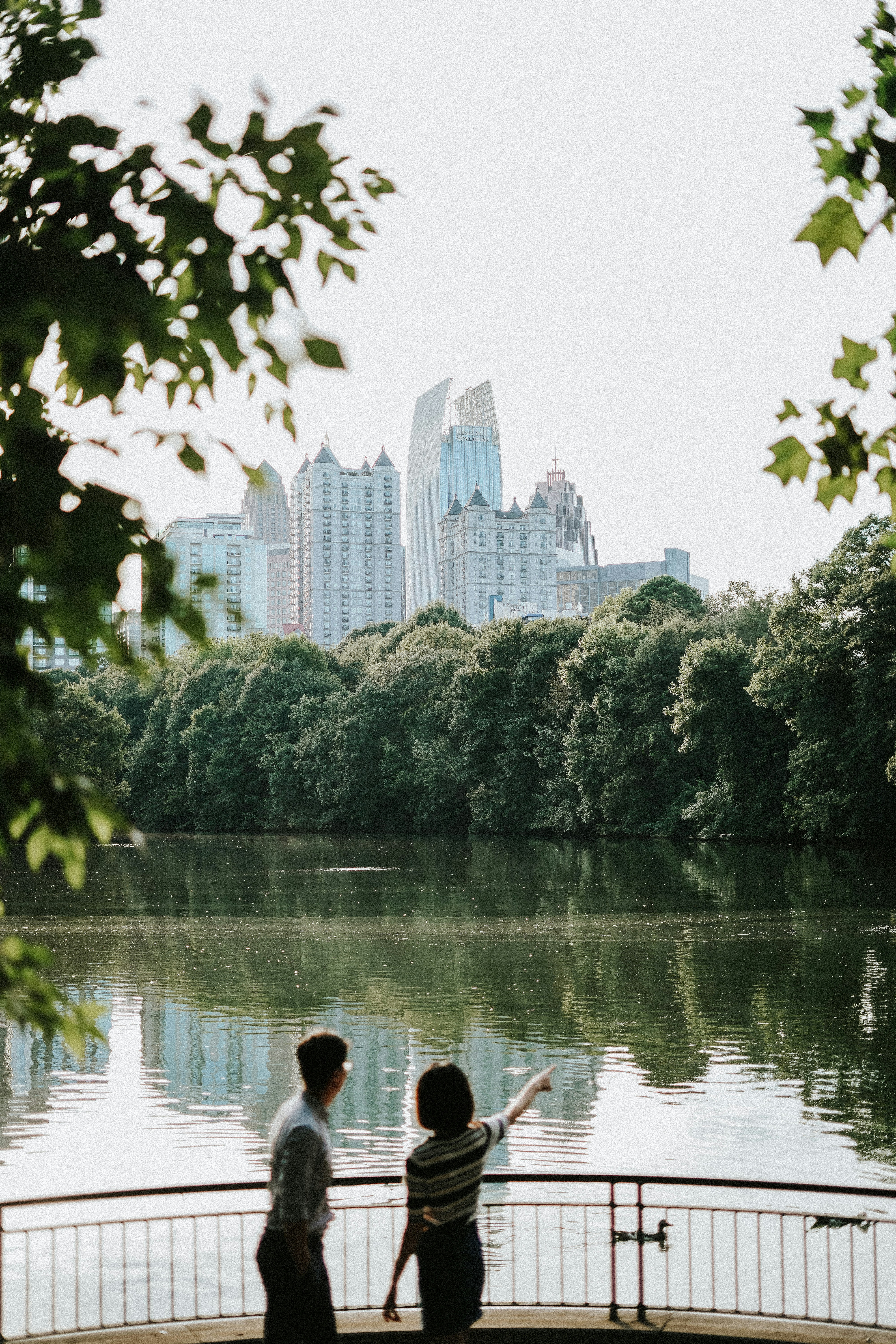 people standing near body of water during daytime