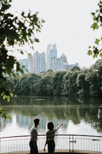 people standing near body of water during daytime