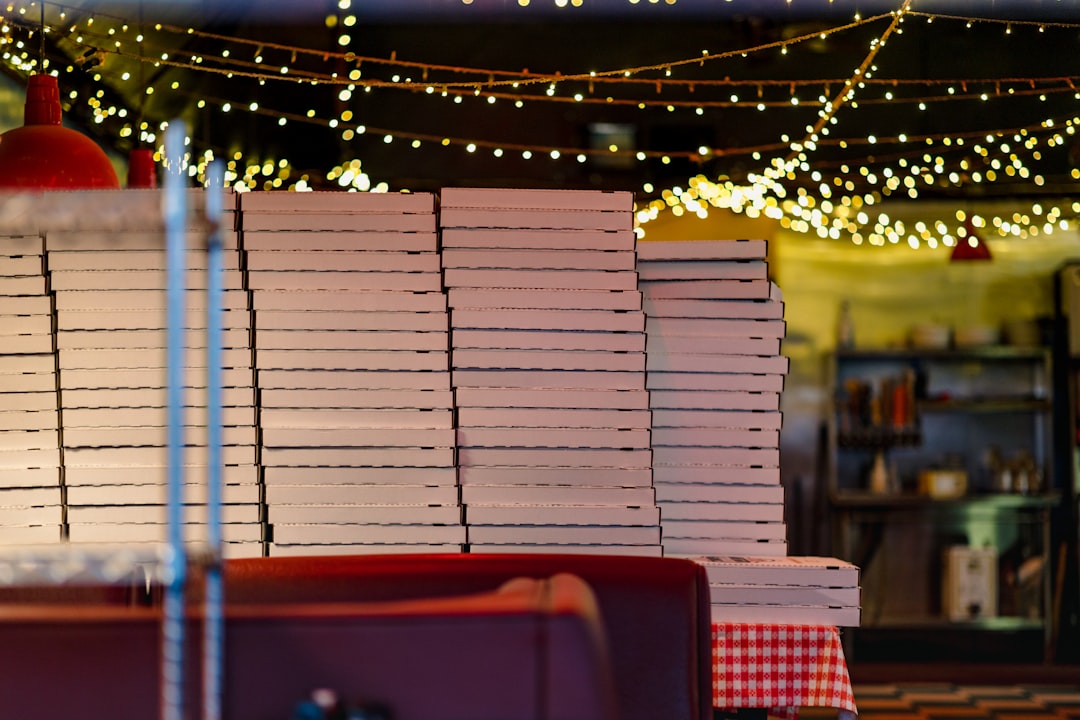 stack of books on red table