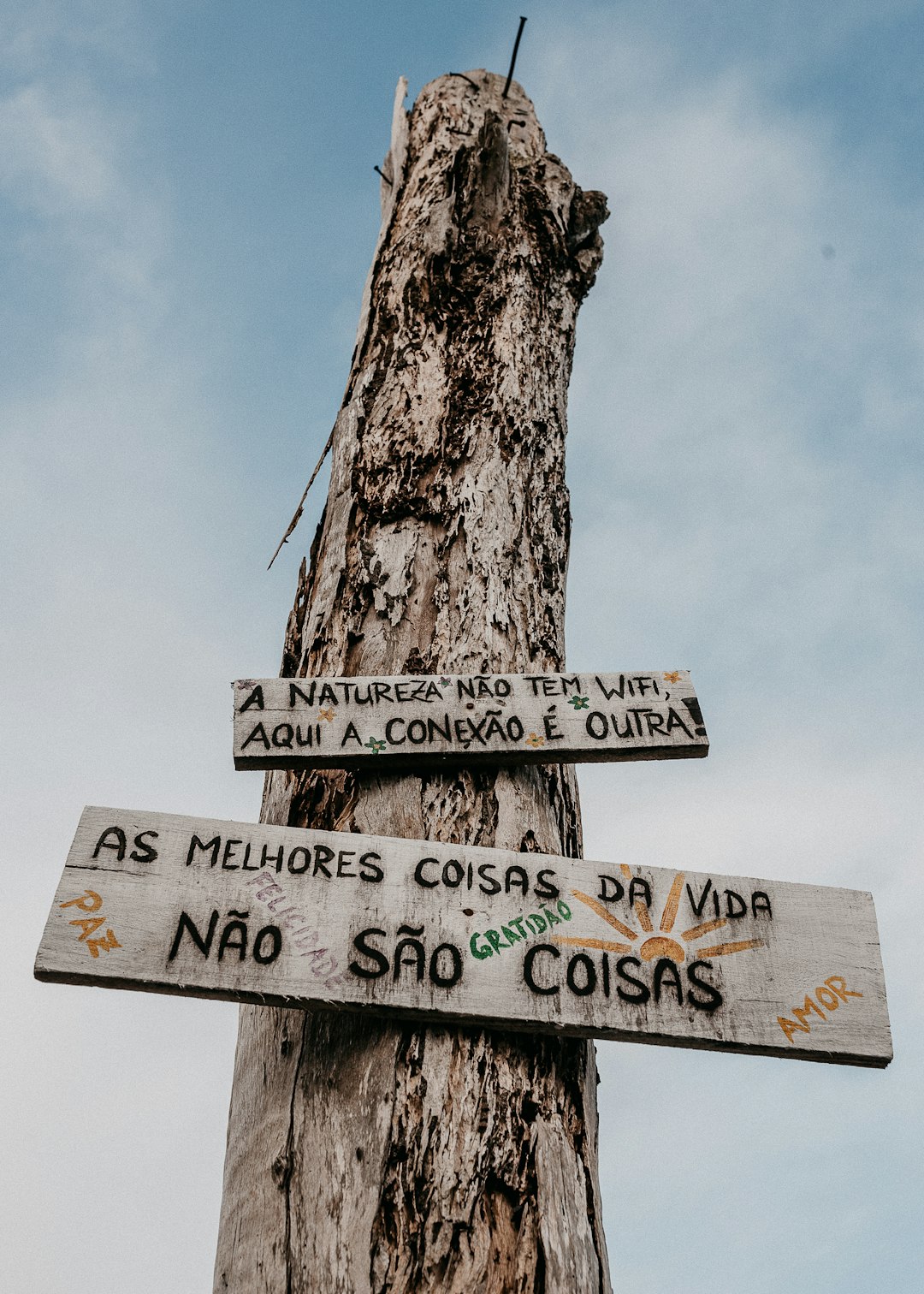 white and black wooden signage