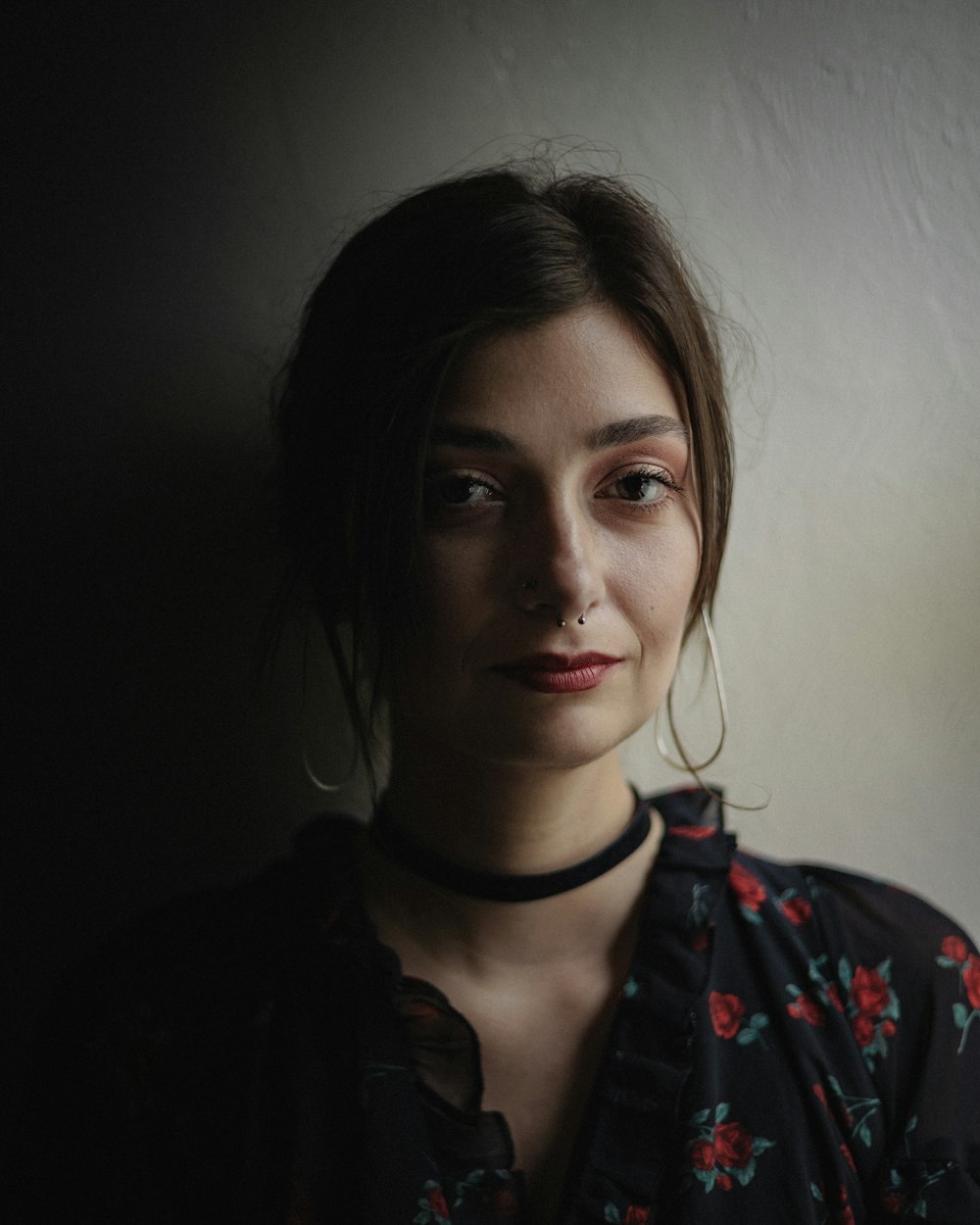 woman in black jacket wearing black earbuds