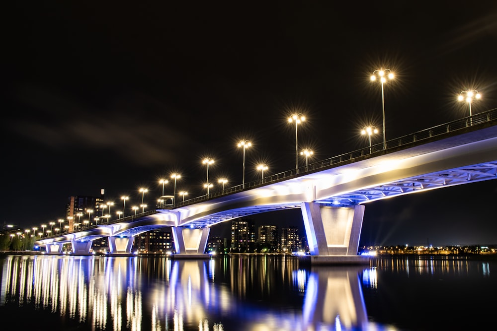 bridge over water during night time