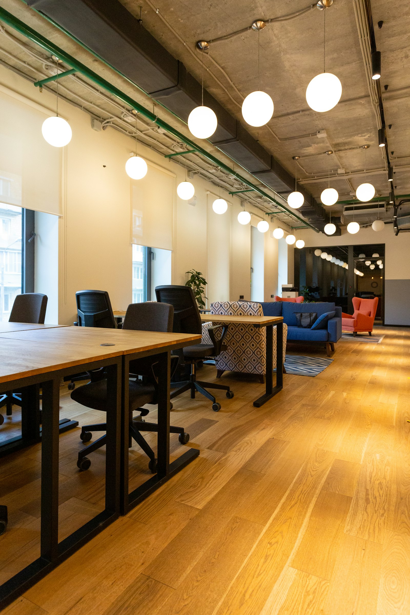 Private office suite with workstations and daylight.