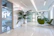 A bright, stylish office interior with clean lines and modern furniture reflecting a recent renovation.