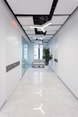 green potted plant on white ceramic floor tiles