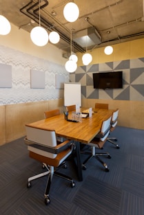 brown wooden table with chairs