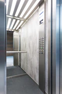 white wooden door with black metal door lever
