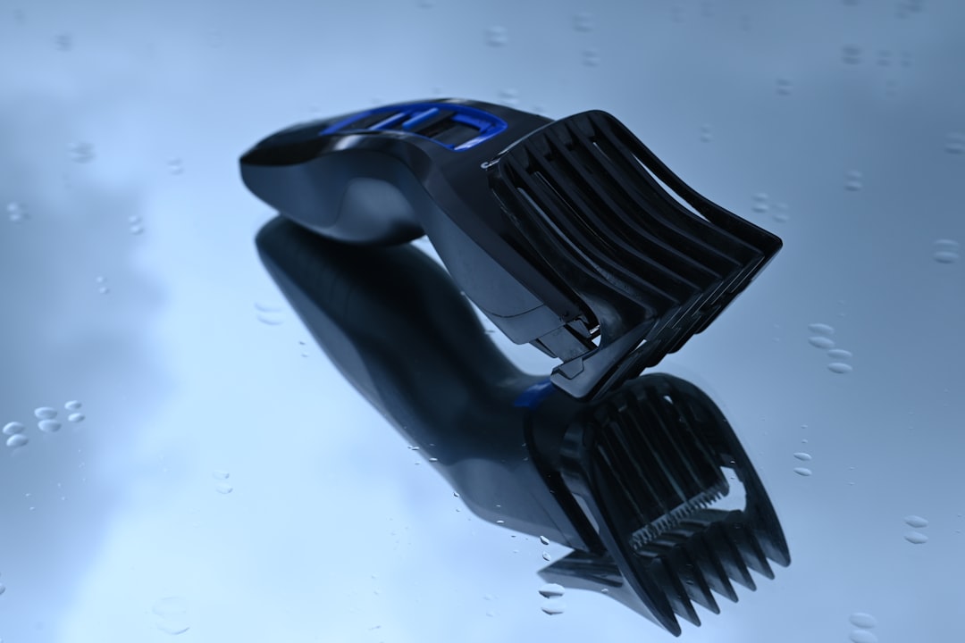 black and blue car hood, Electric Hair Clipper on the mirror