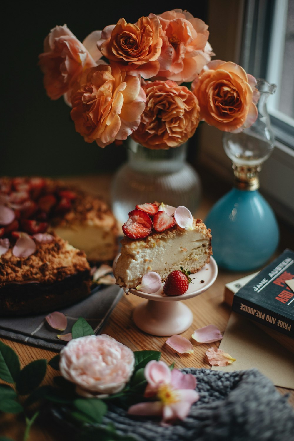 orange and pink roses on white ceramic plate