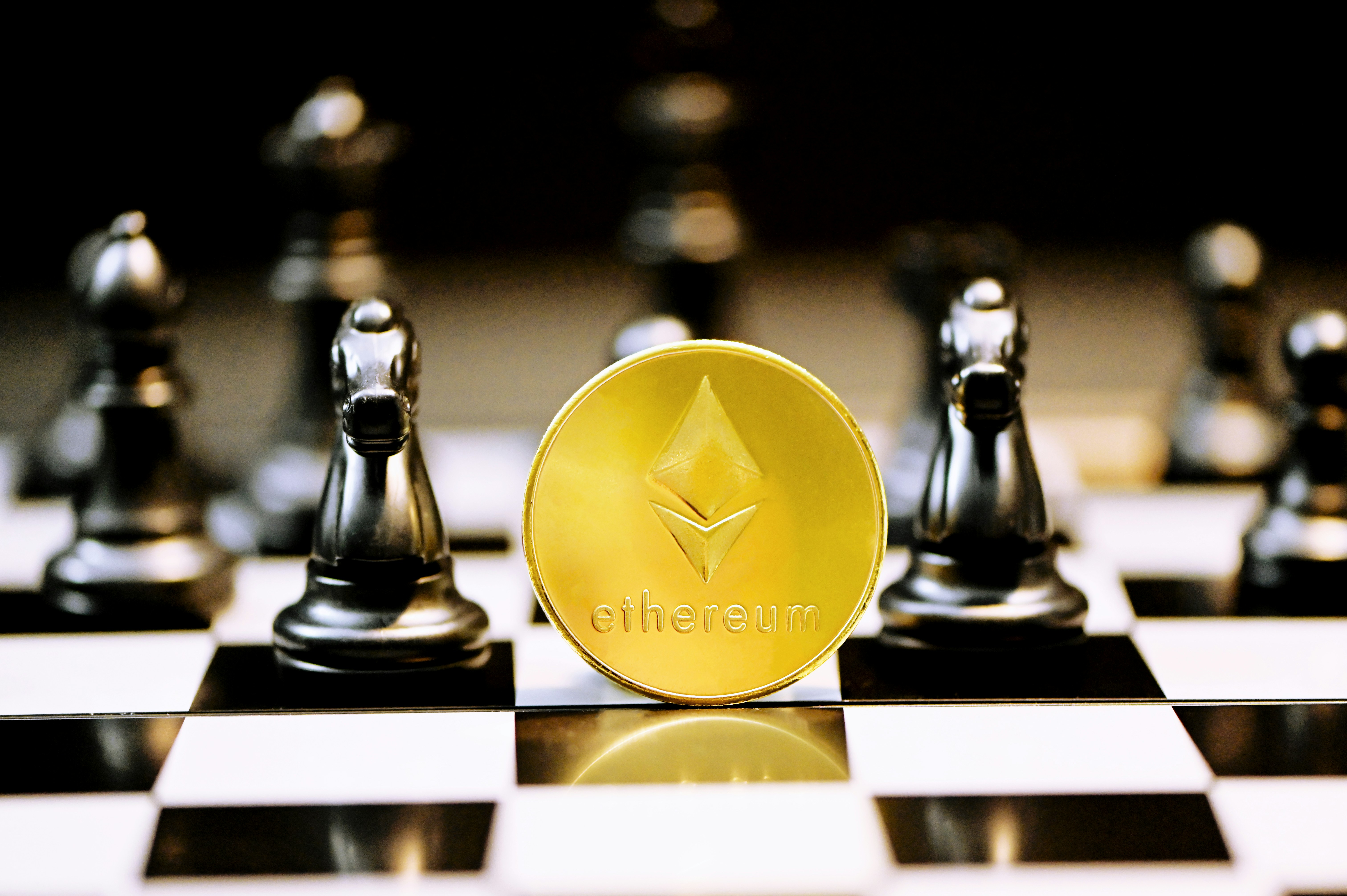 A single Ethereum coin stands on the chess table