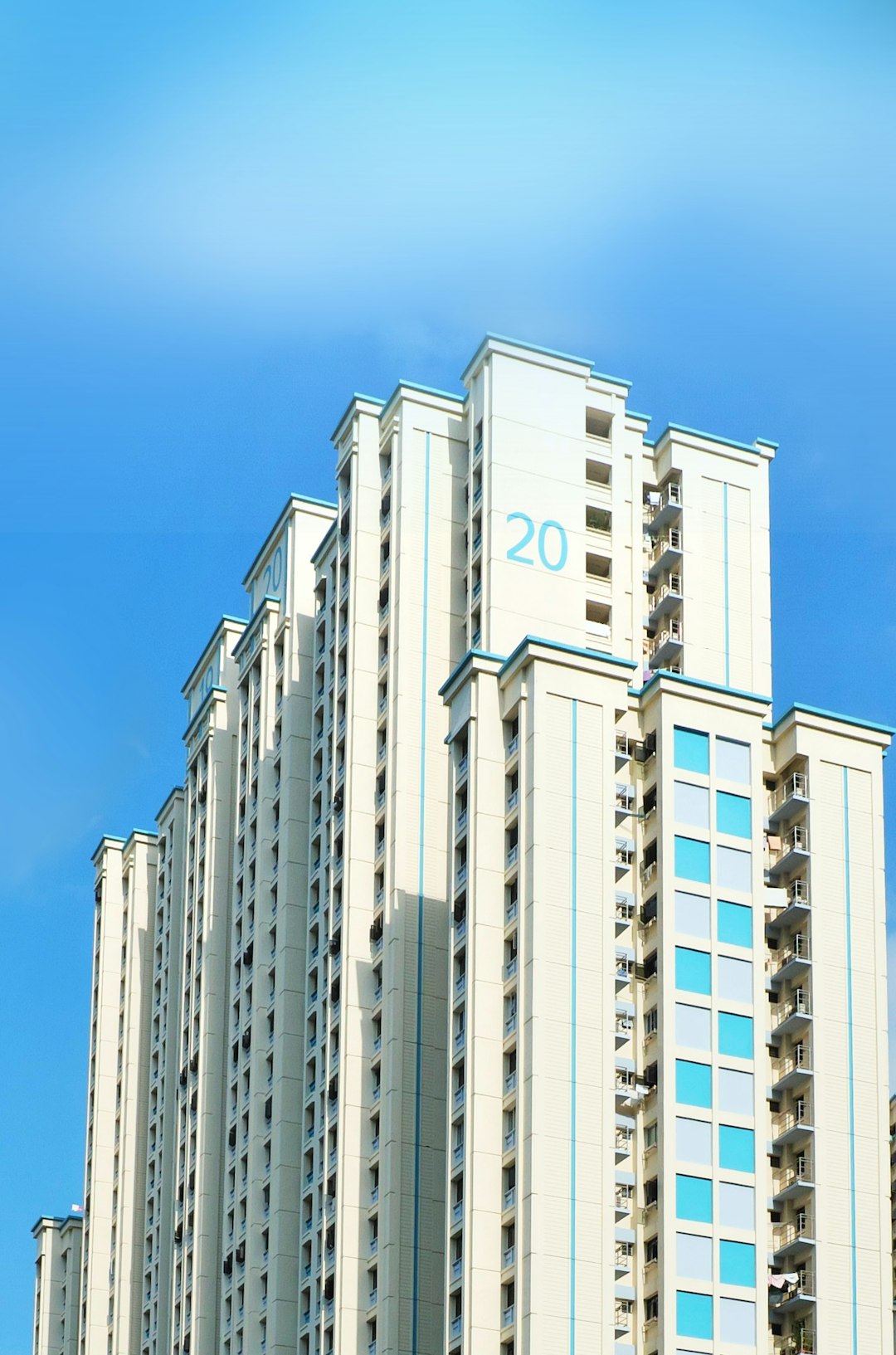 white concrete building under blue sky during daytime