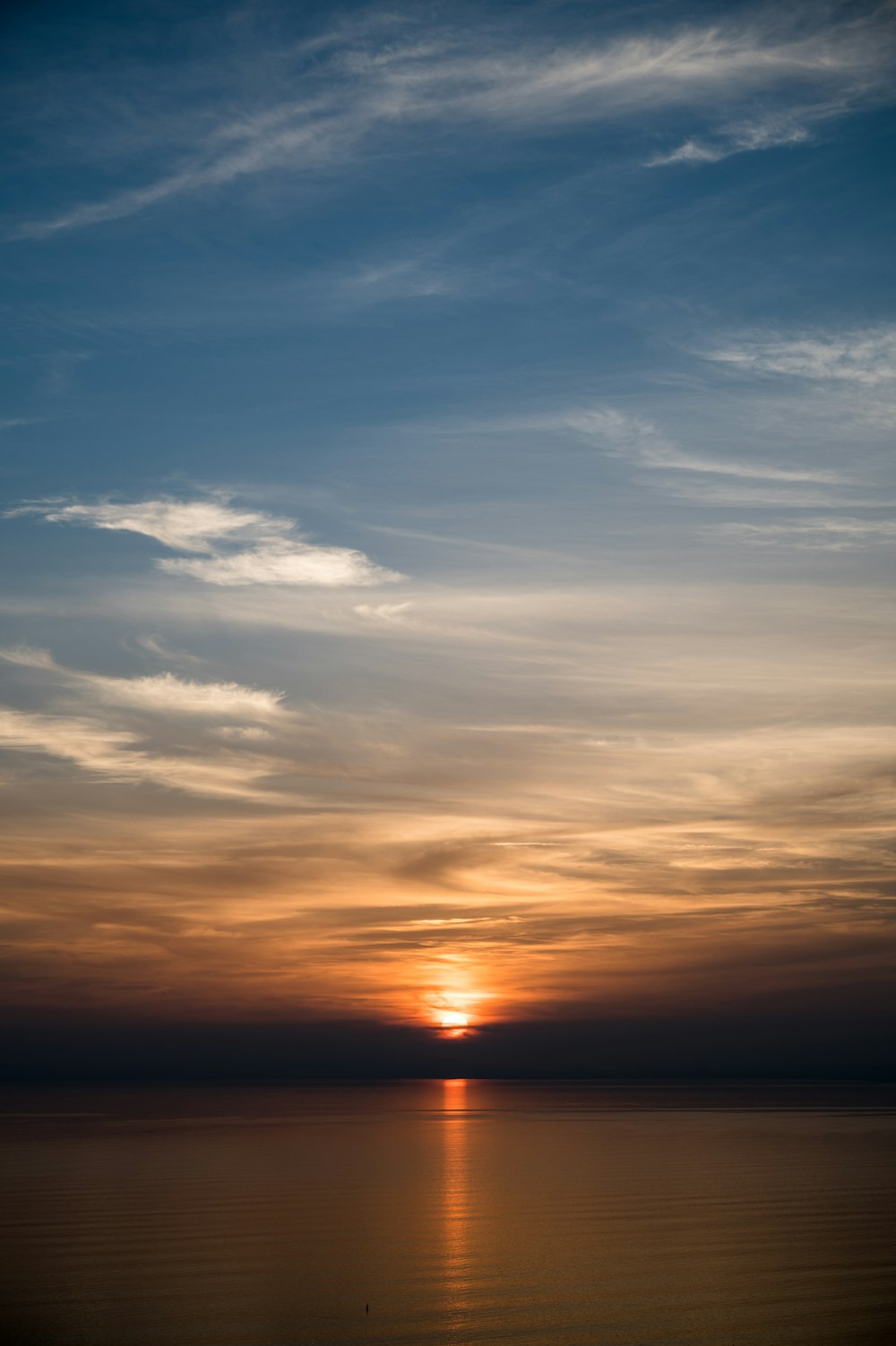 silhouette of clouds during sunset