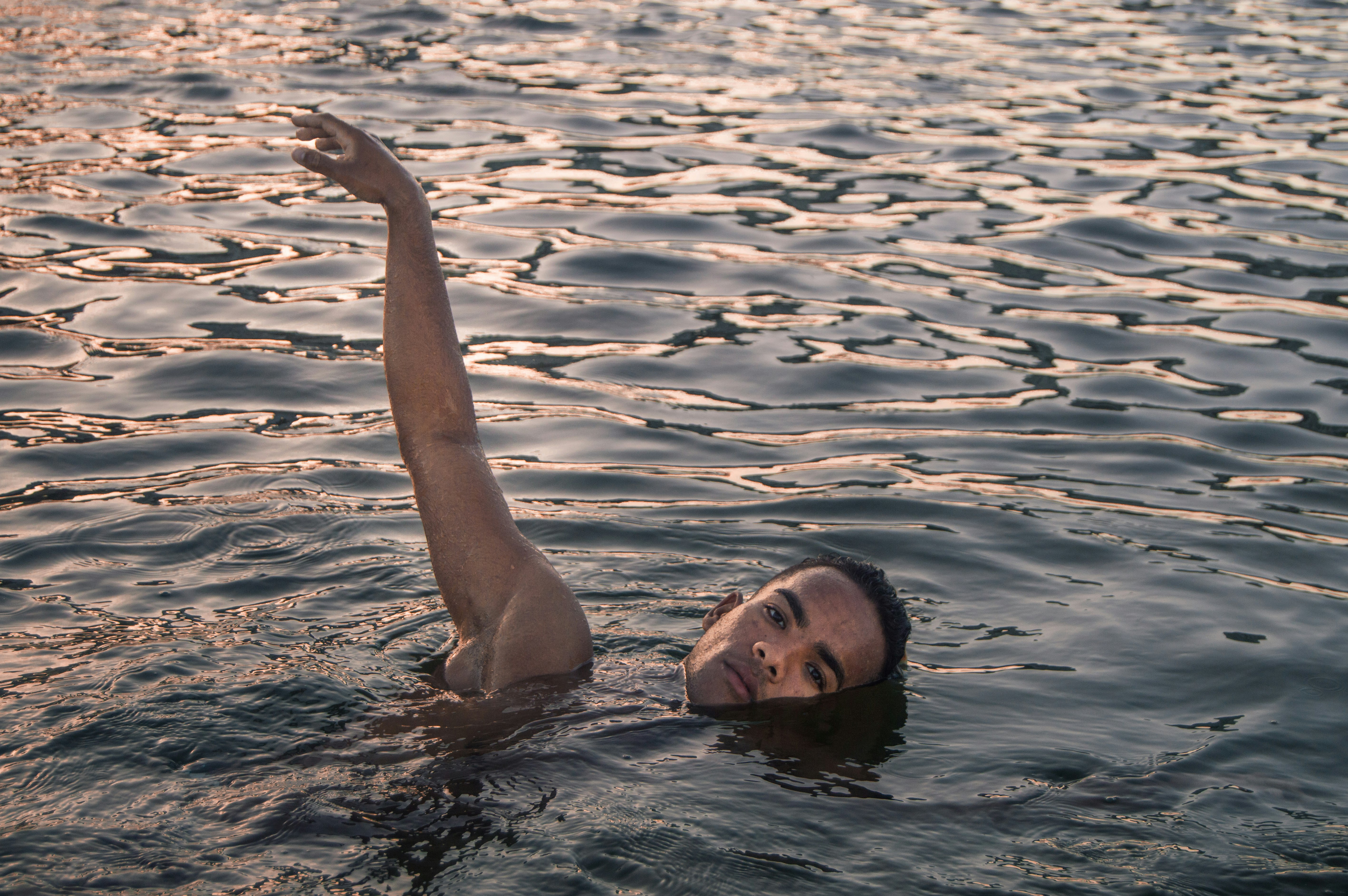 woman in water during daytime