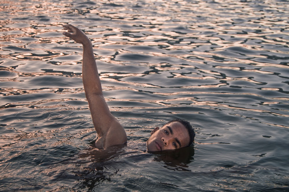 woman in water during daytime