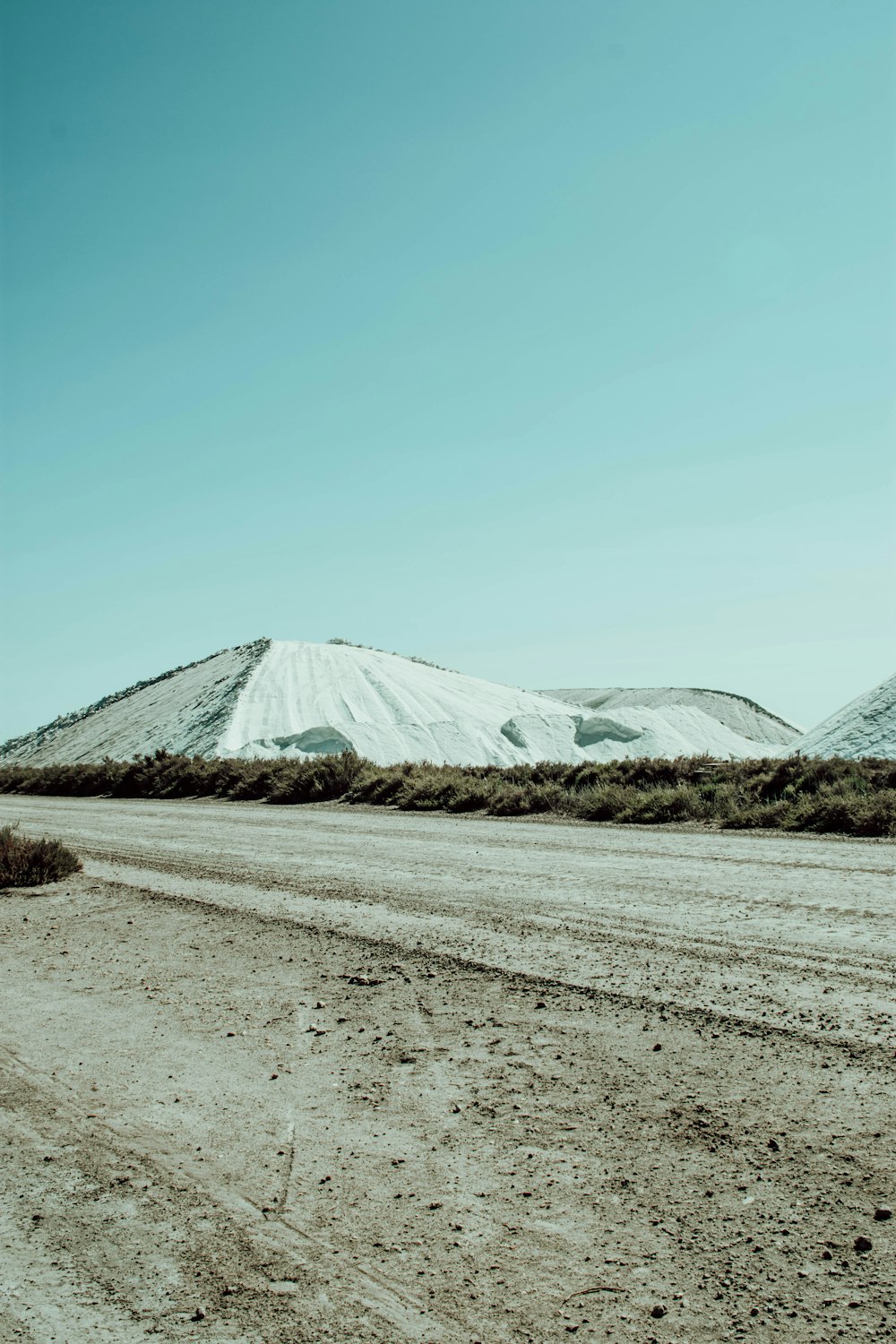 white and brown mountain under blue sky during daytime