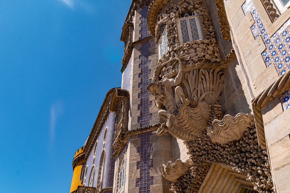 gold dragon statue on top of building