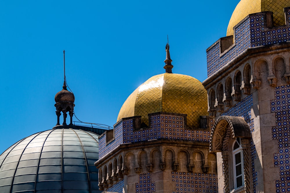 gold dome building under blue sky during daytime