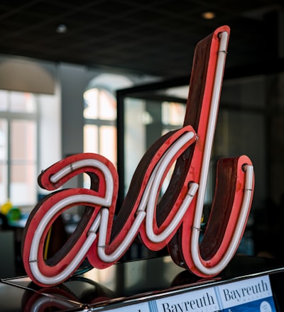 red and white love neon light signage