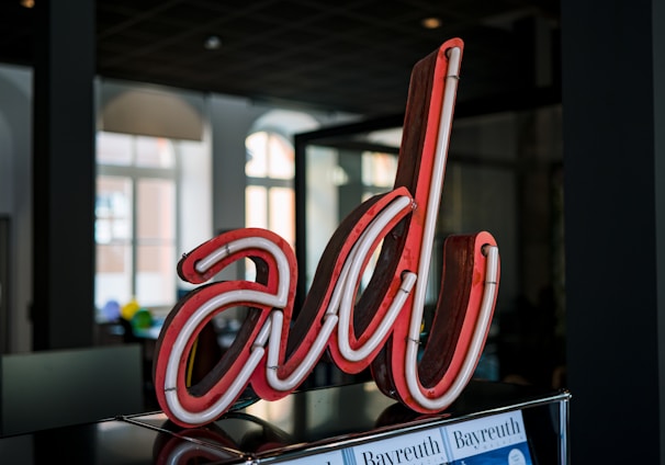 red and white love neon light signage