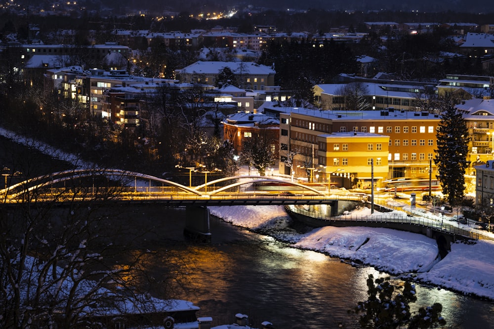 bridge over river during night time