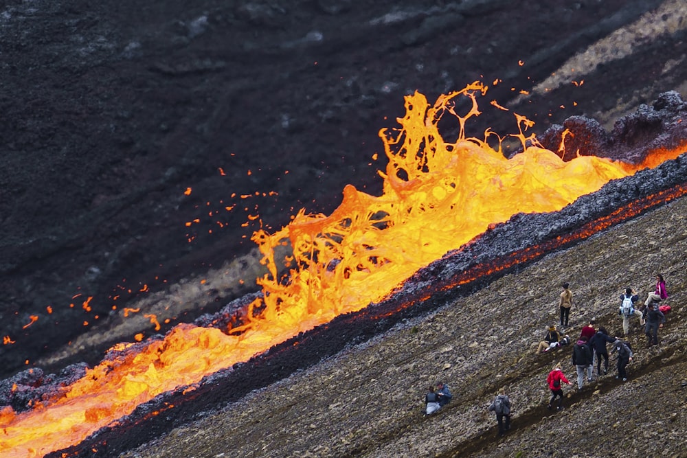 orange and black flame on black surface