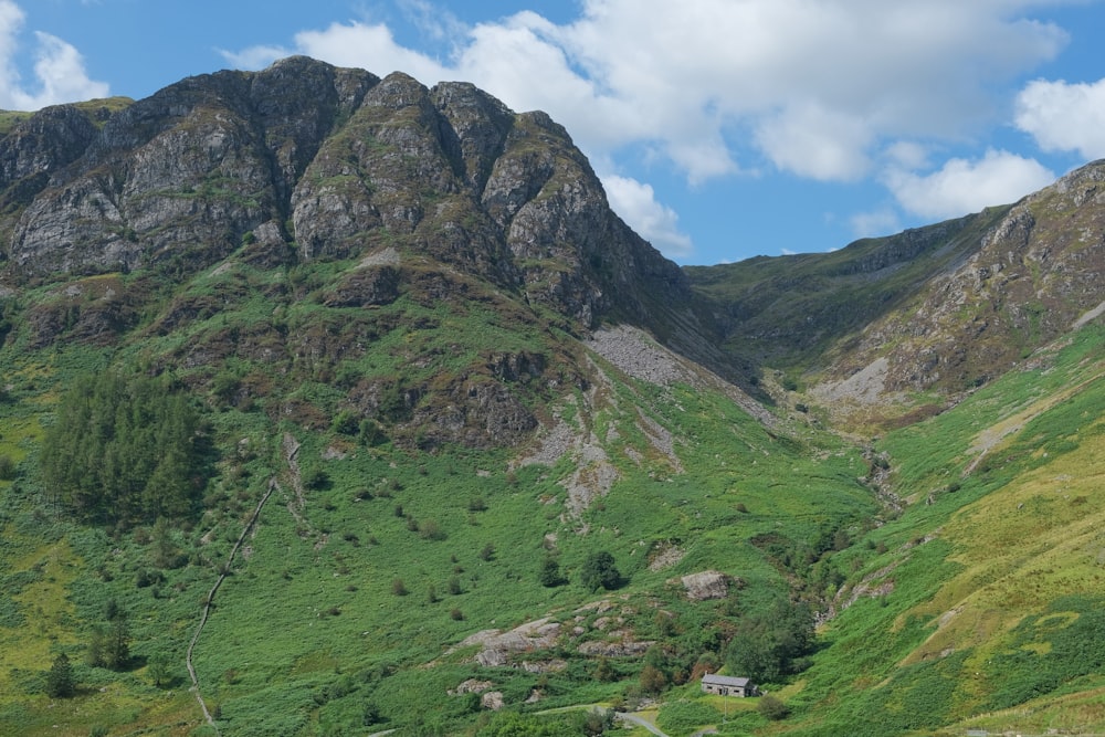 green and brown mountain under blue sky during daytime