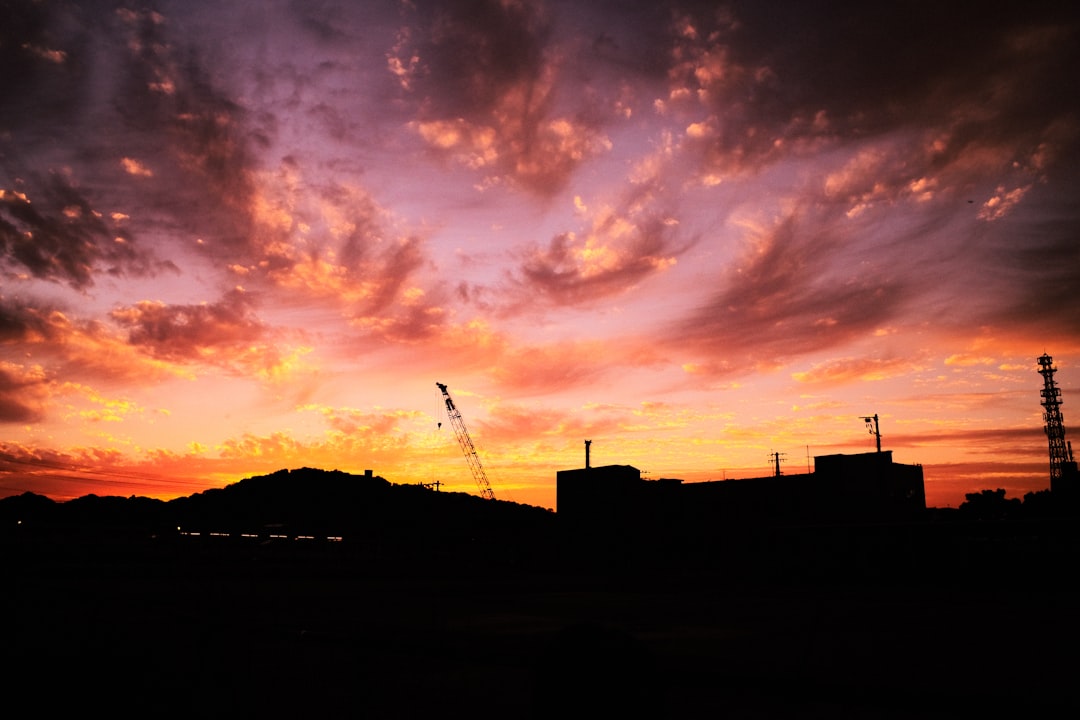 silhouette of building during sunset