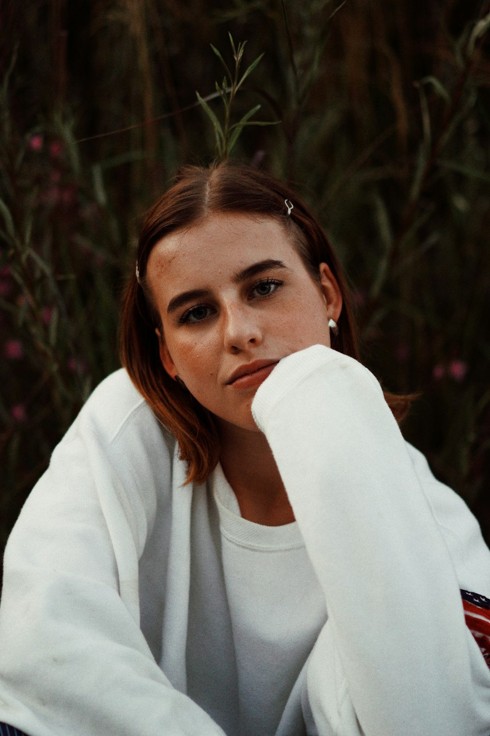 woman in white long sleeve shirt