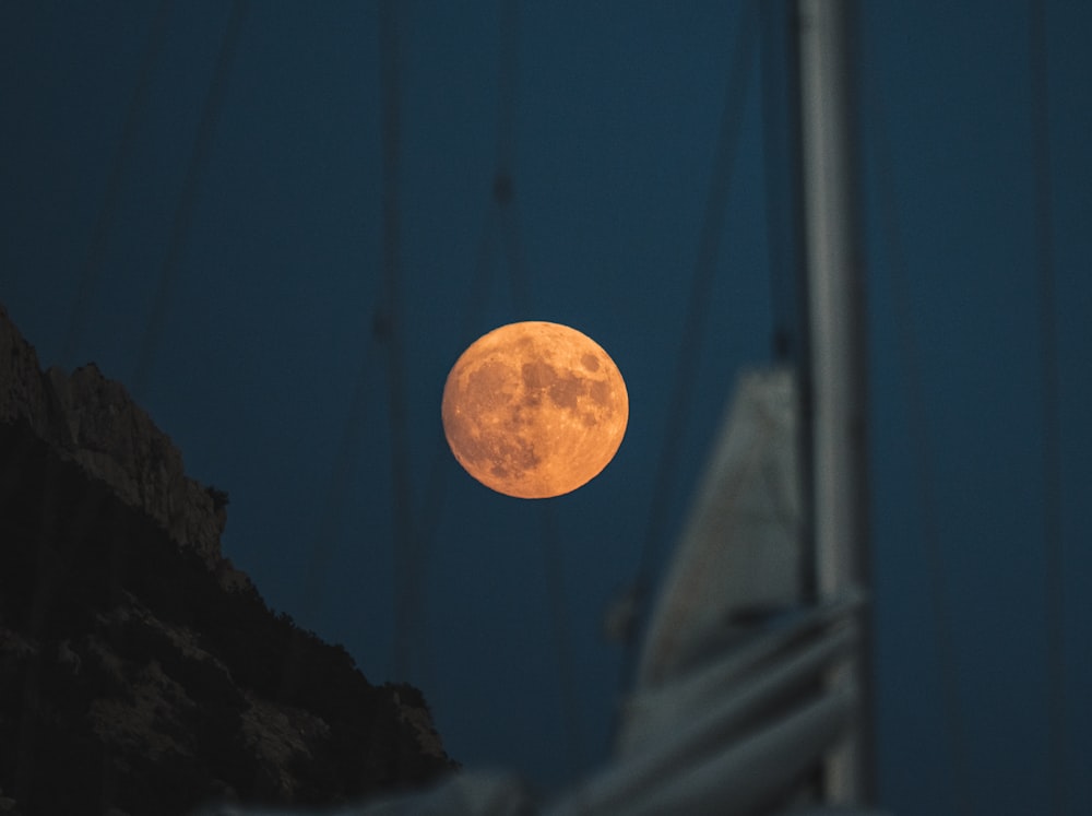 full moon over the dark sky