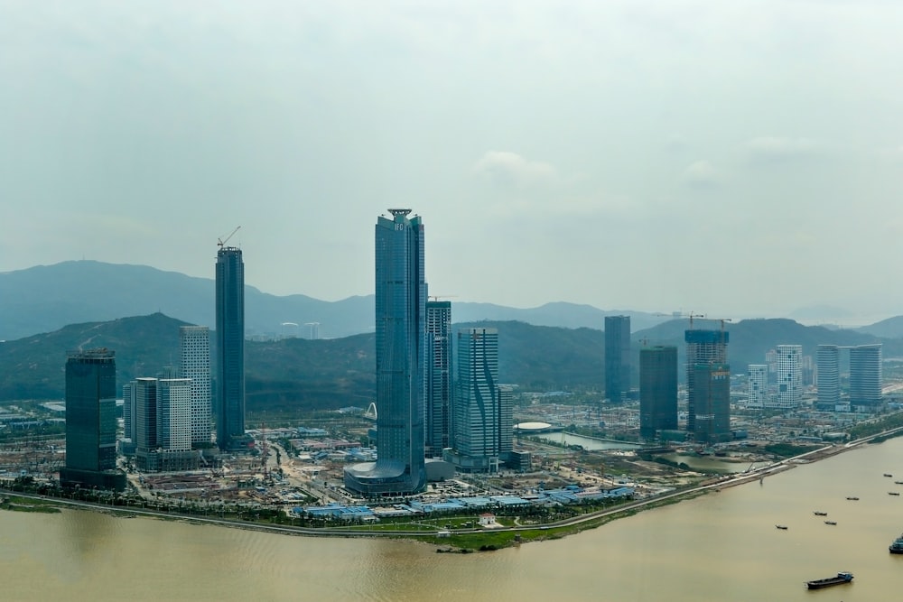 city skyline under white sky during daytime