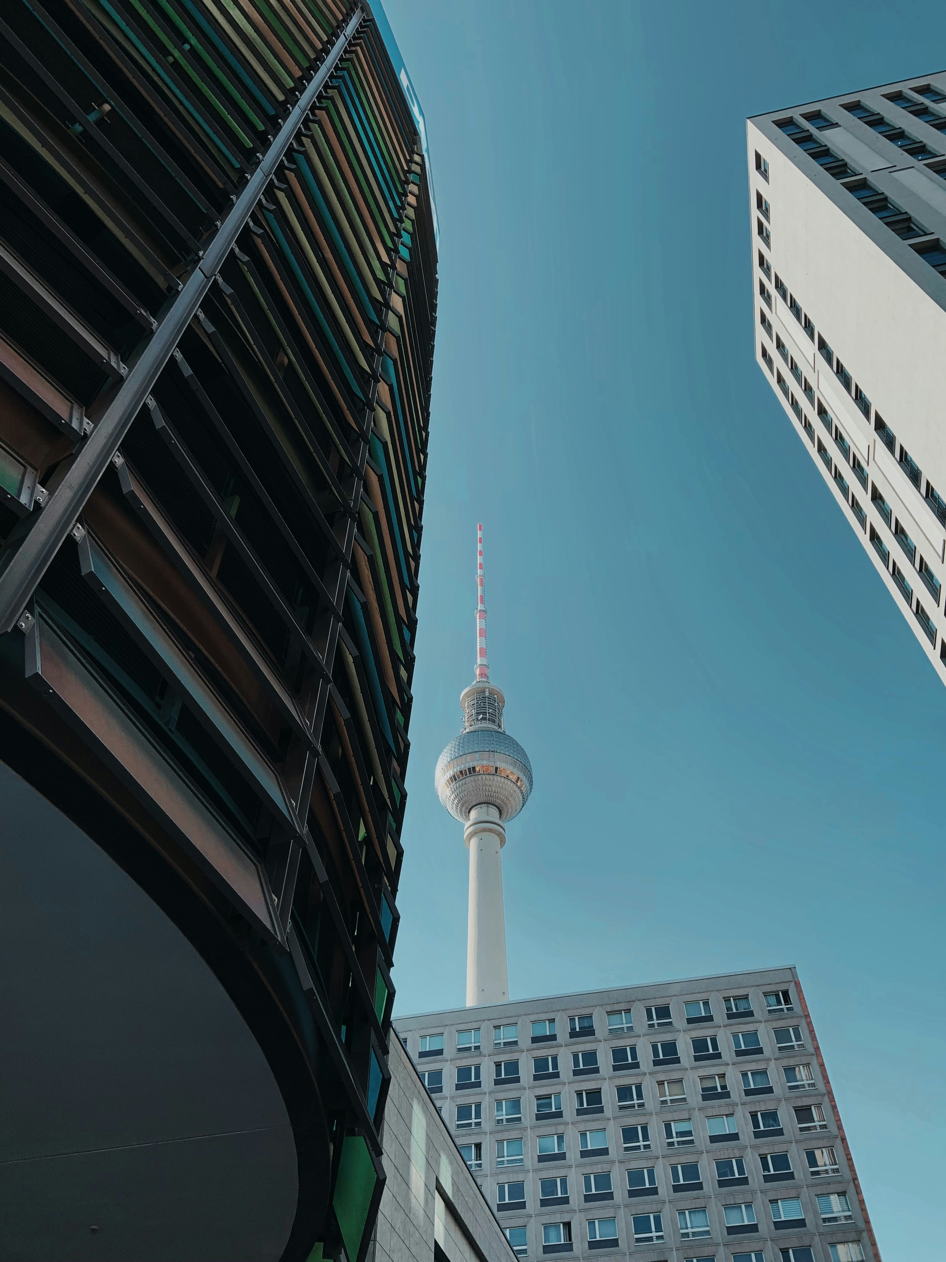 white concrete tower under blue sky during daytime