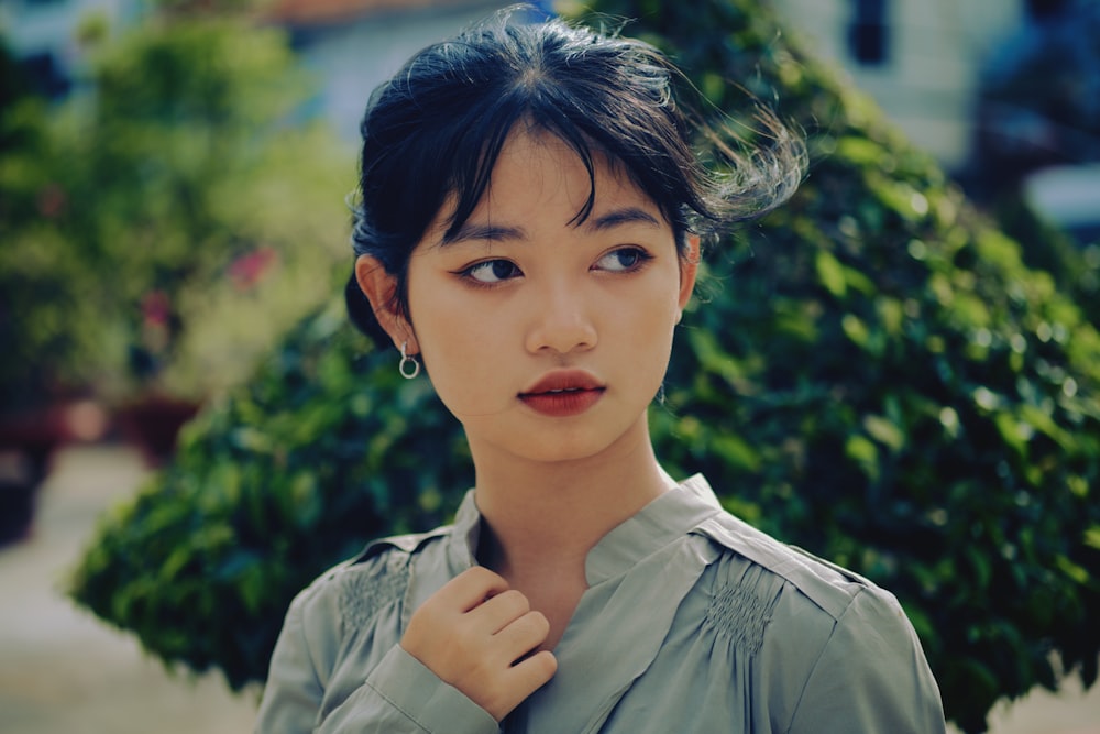 girl in grey button up shirt