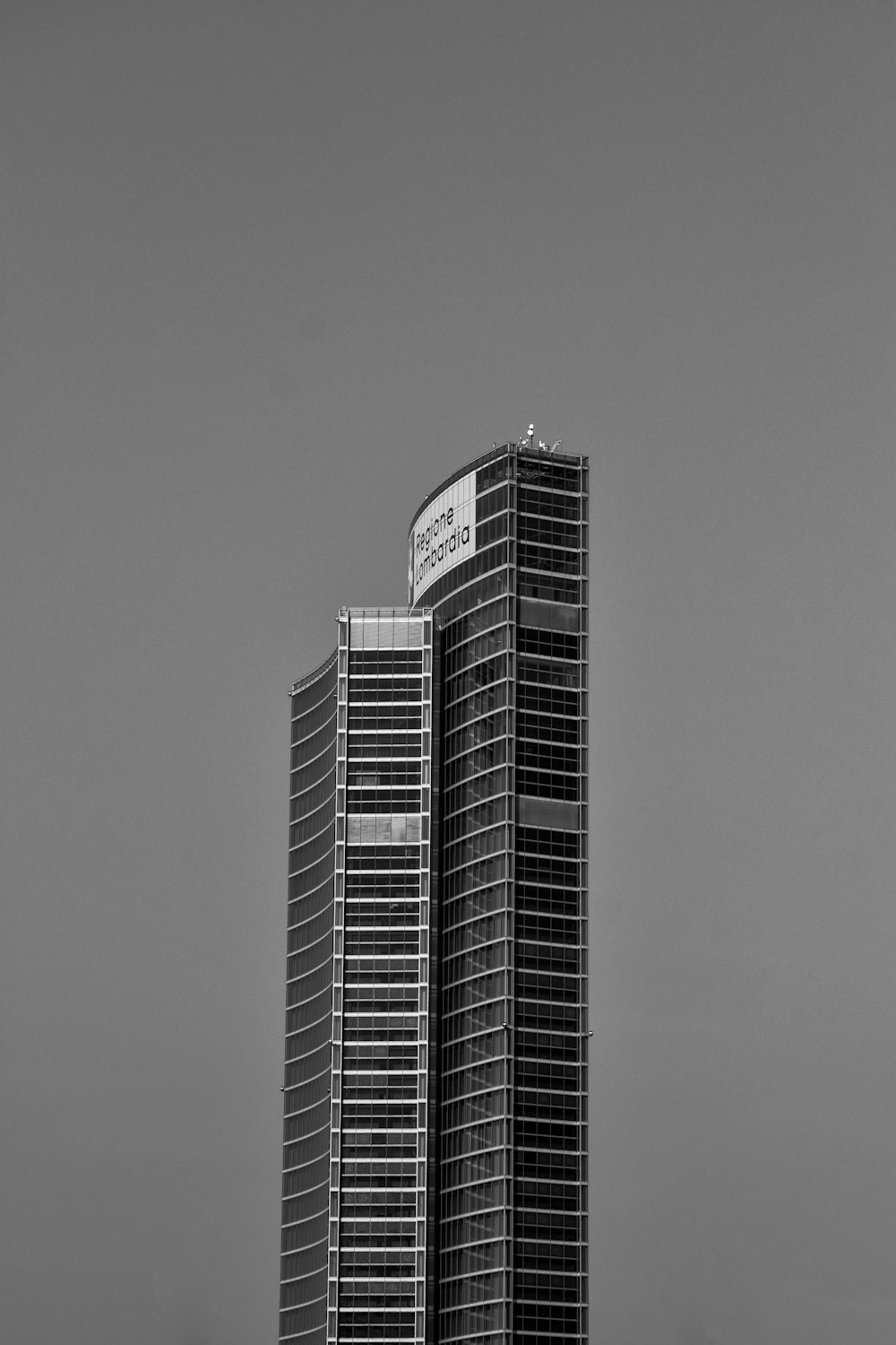 grayscale photo of high rise building