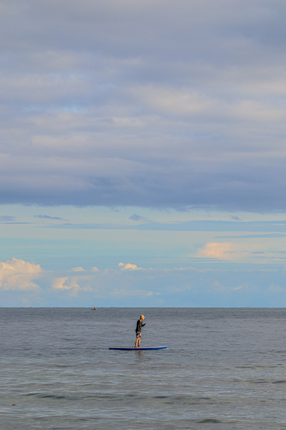 man and woman on boat on sea during daytime