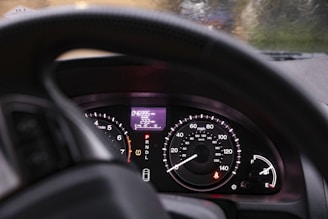 black car instrument panel cluster on driving lesson