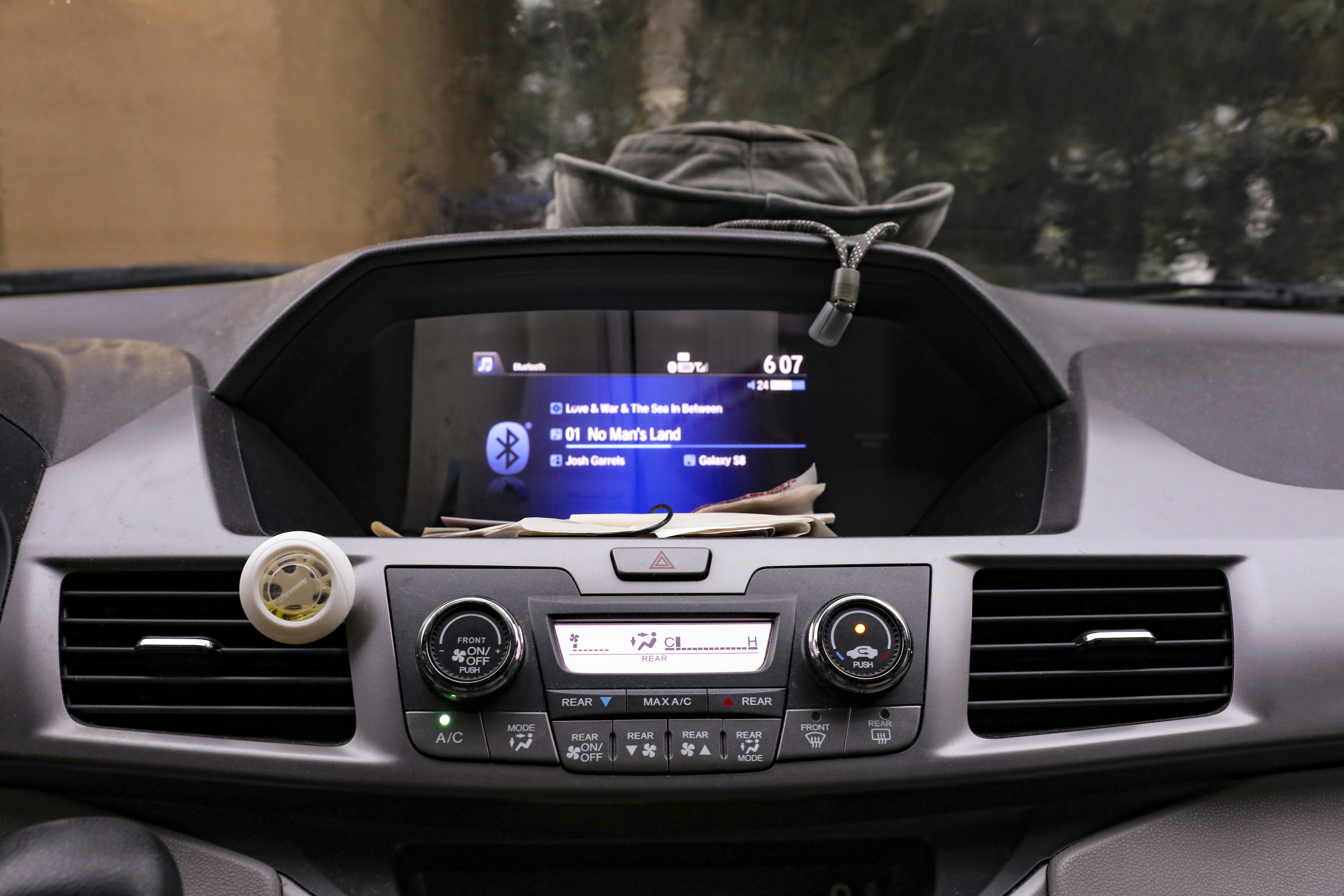 Electric vehicle dashboard display showing battery health and energy information