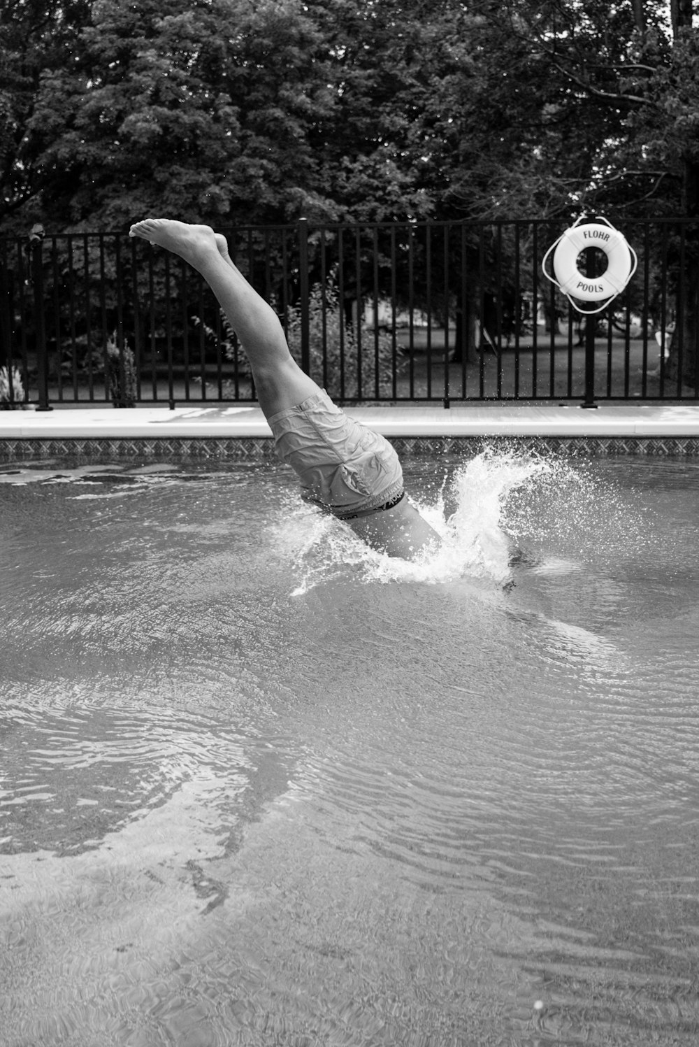 grayscale photo of woman in water