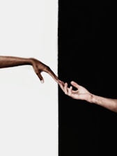 persons feet on white wall