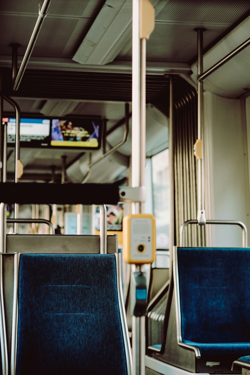 blue and yellow bus seat