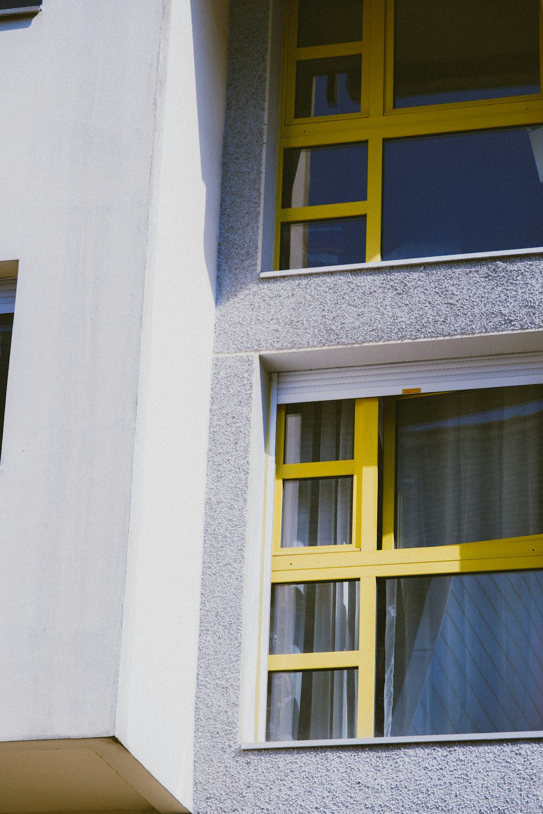 white framed glass window closed