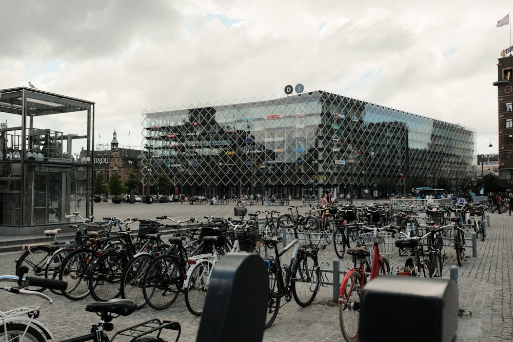 bicycle parked on parking lot near building during daytime