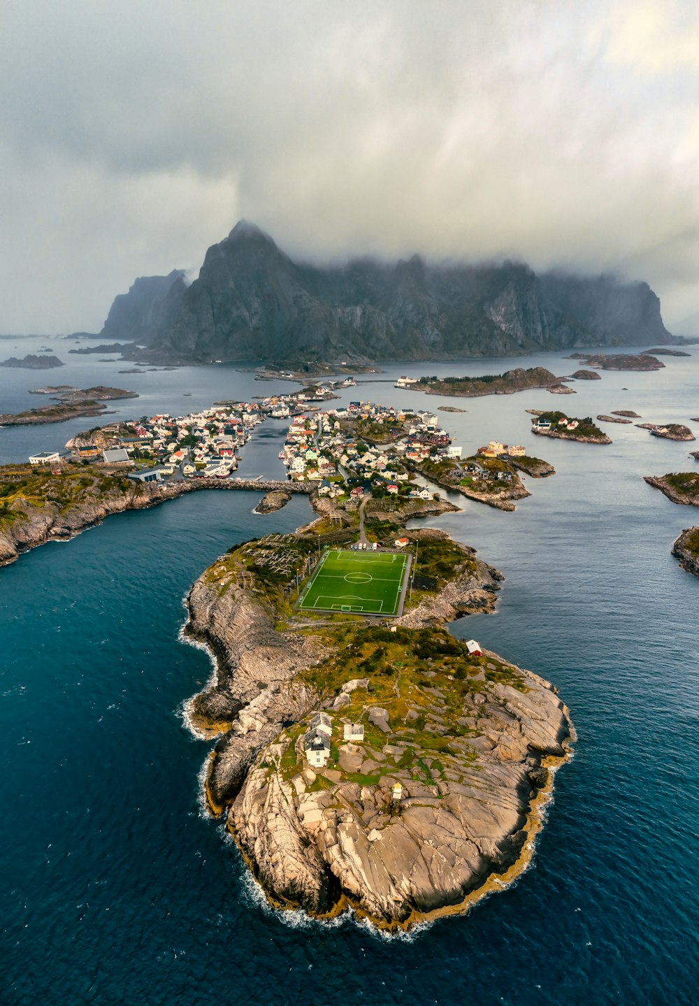 an aerial view of a small island in the middle of the ocean