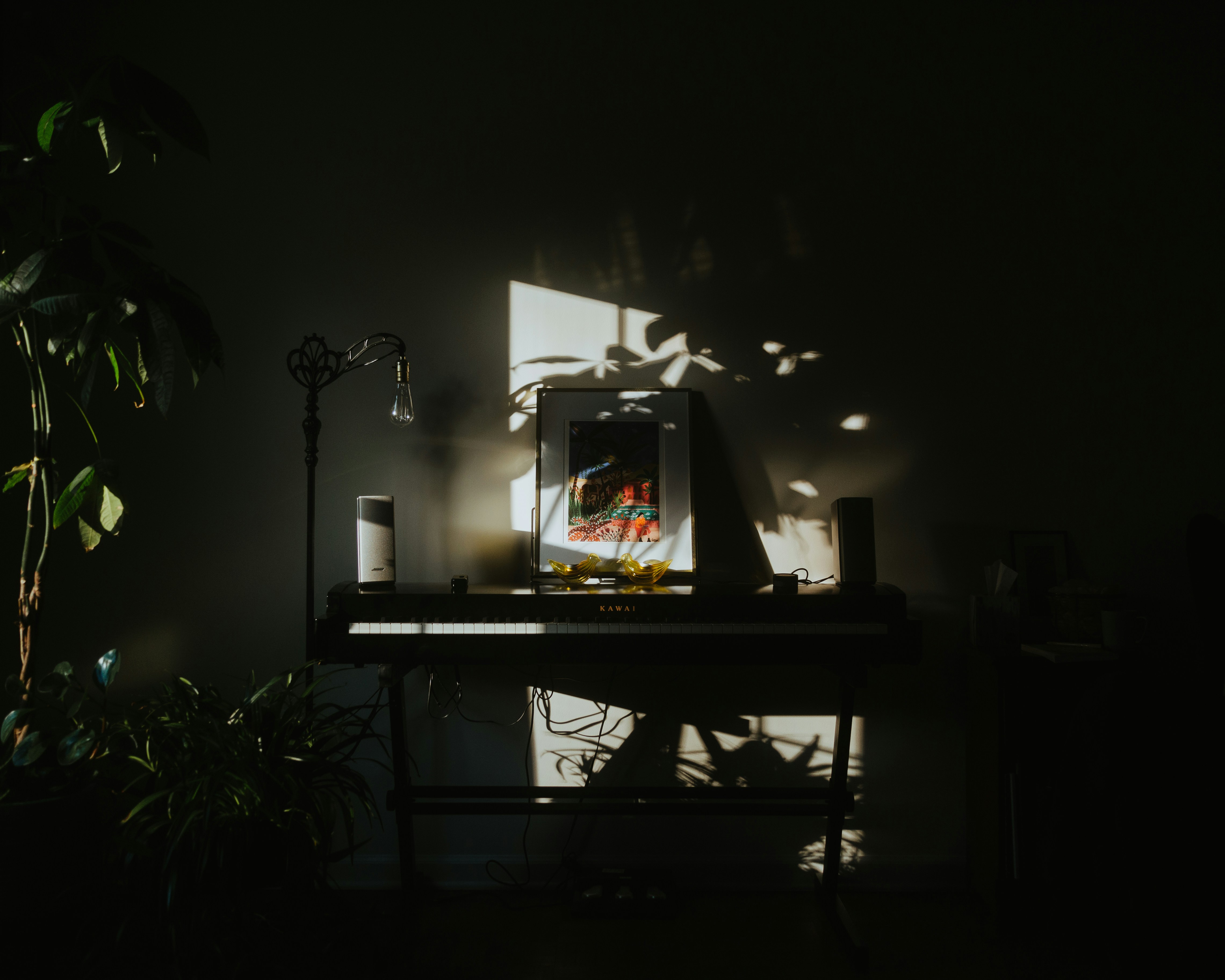 black flat screen tv turned on on black wooden tv rack