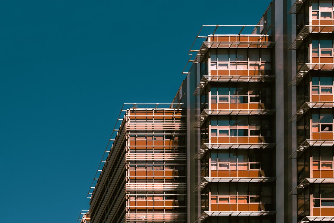 brown concrete building under blue sky during daytime