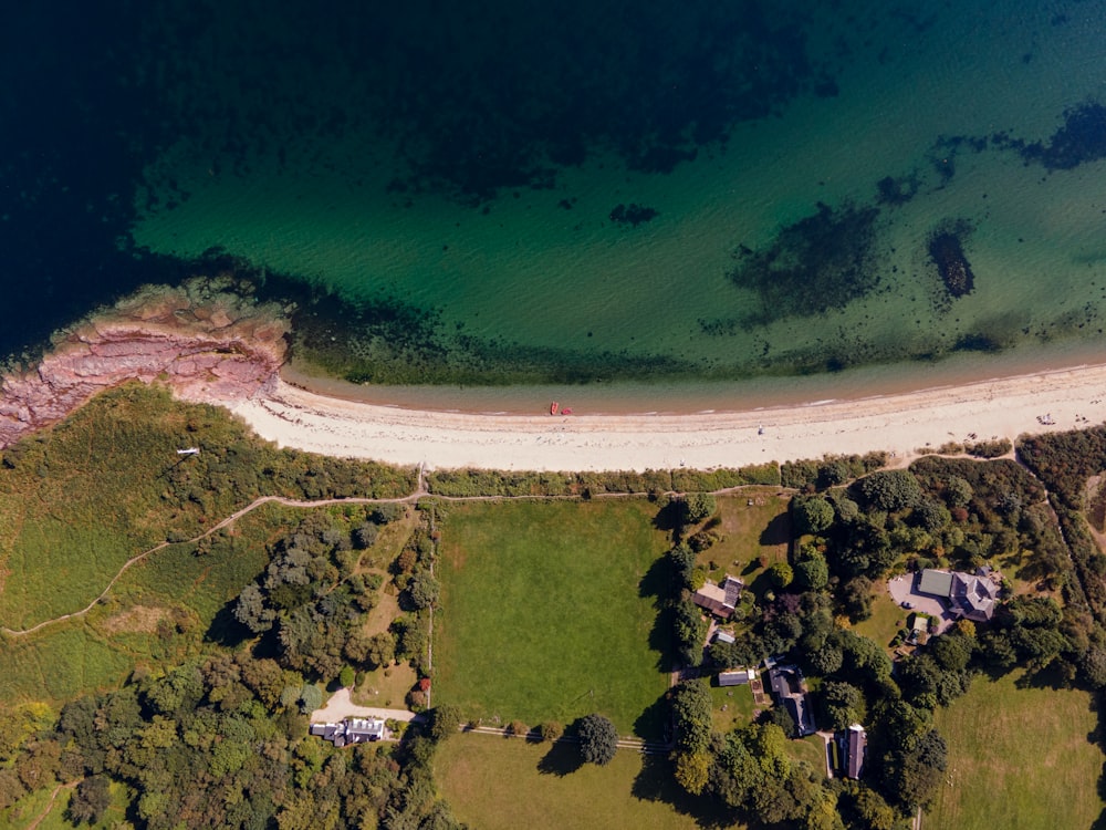 an aerial view of a beach and a body of water