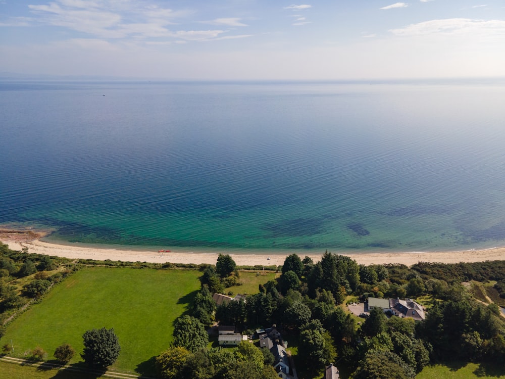 an aerial view of a beach and a body of water