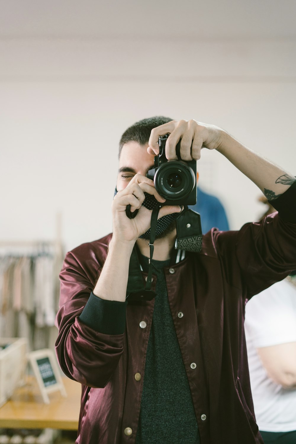 a man taking a picture of himself with a camera