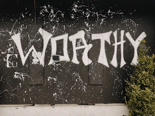 black and white graffiti on wall